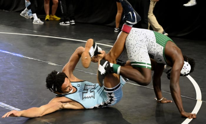 Nikolas Hoffman of Hagerty picks up a win against Colson Hoffman from Central during 138-pound semifinals match on Saturday at the Knockout Christmas Classic at Silver Spurs Arena in Kissimmee.